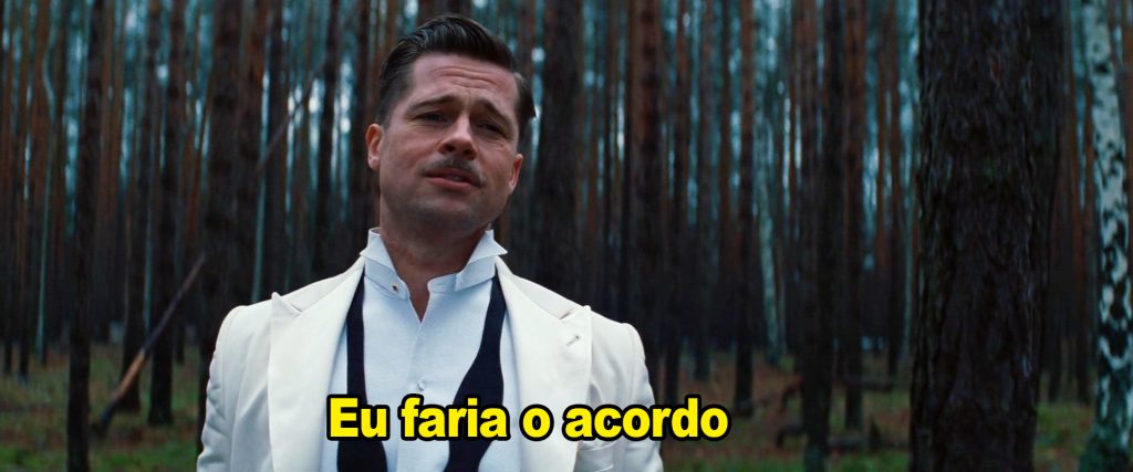 Brad Pitt com bigode e terno branco em uma floresta, legenda "Eu faria o acordo".
