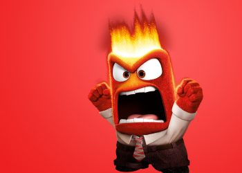 O personagem Raiva, do filme Divertida Mente da Disney/Pixar. Ele é vermelho, está gritando com os punhos cerrados e fogo saindo da cabeça, representando a raiva descontrolada.