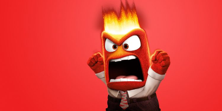 O personagem Raiva, do filme Divertida Mente da Disney/Pixar. Ele é vermelho, está gritando com os punhos cerrados e fogo saindo da cabeça, representando a raiva descontrolada.